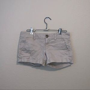 khaki shorts with pockets.